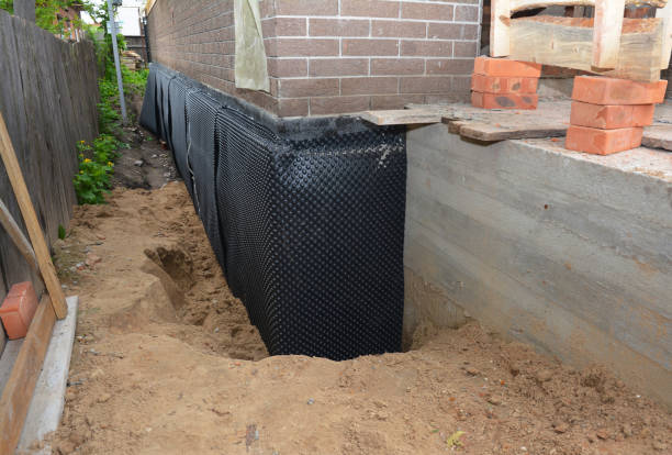 SJ Waterproofing Pros technician performing targeted Waterproofing assessment in Glen Mills, PA